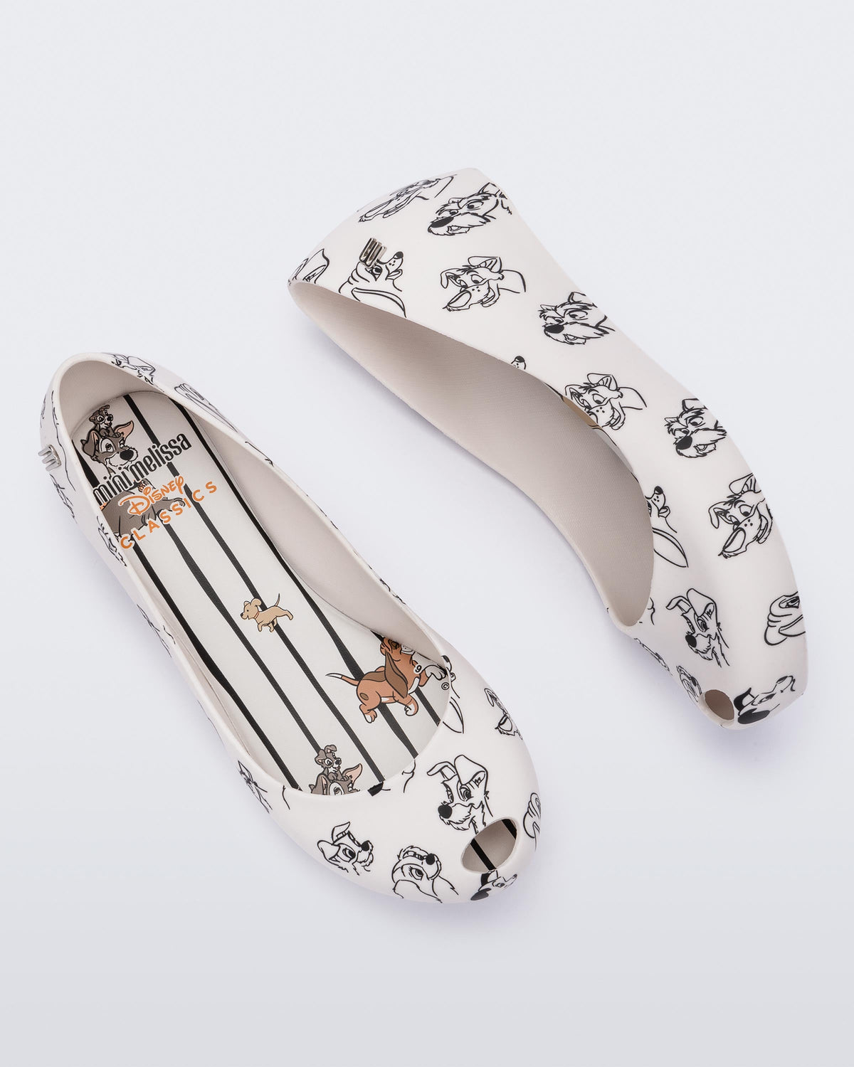 A top and side view of a pair of white/grey Mini Melissa Ultragirl Cats & Dogs flats with a white base and cartoon dog face drawing pattern across the base.