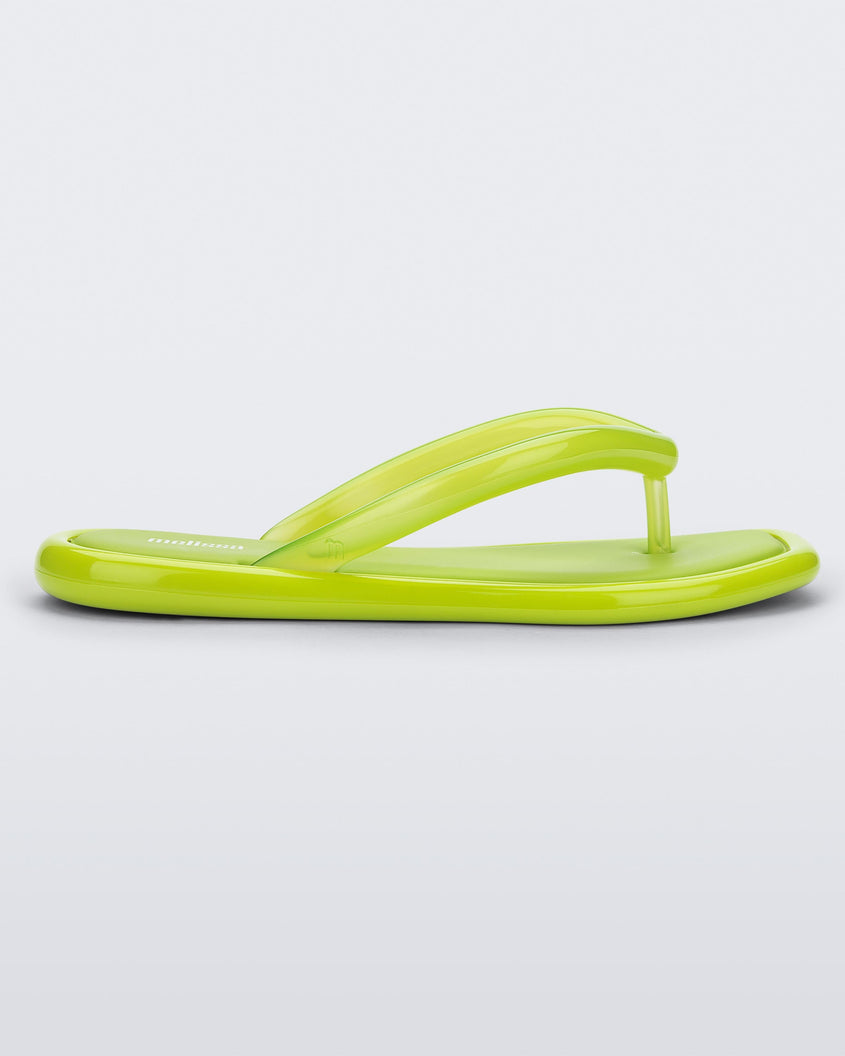 Side view of green Melissa Airbubble Flip Flop.