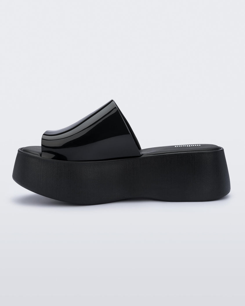Inside view of a black Melissa Becky platform slide.