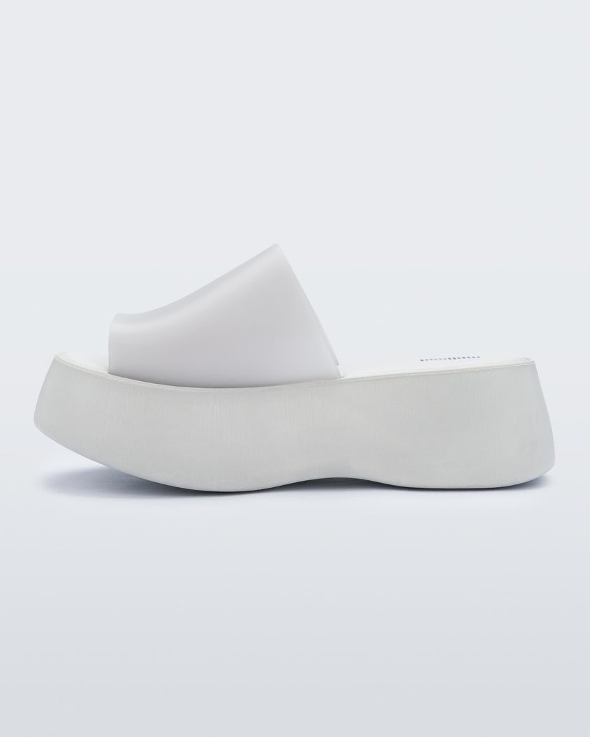 Inside view of a white Melissa Becky platform slide.