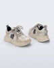 Back and angled view of a pair of off white X Beat kids sneakers with black trim
