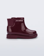Side view of a burgundy Chelsea II baby boot