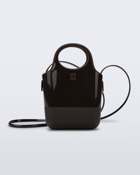 Front view of a brown Ultra Bag with handle and strap