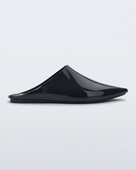 Side view of a grey She slip on with pointed toe
