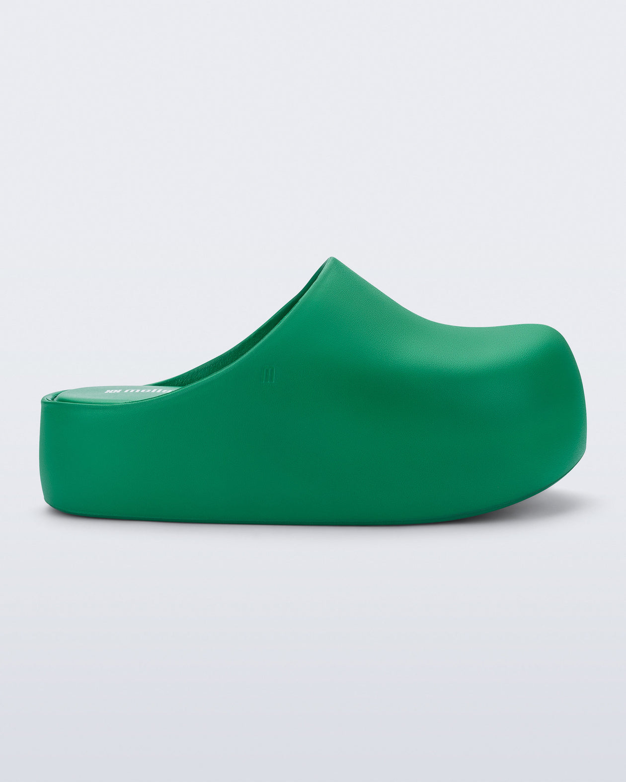 Side view of a green Free Clog Up Platform 