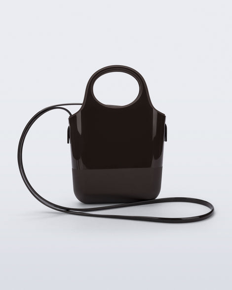 Back view of a brown Ultra Bag with handle and strap