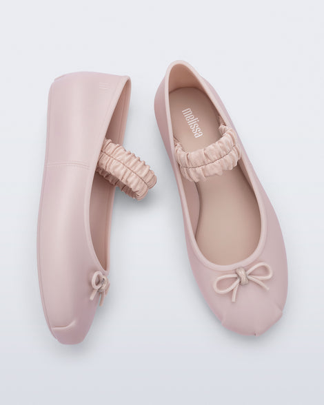 Side and top view of a pair of pink Sophie Scrunch flats