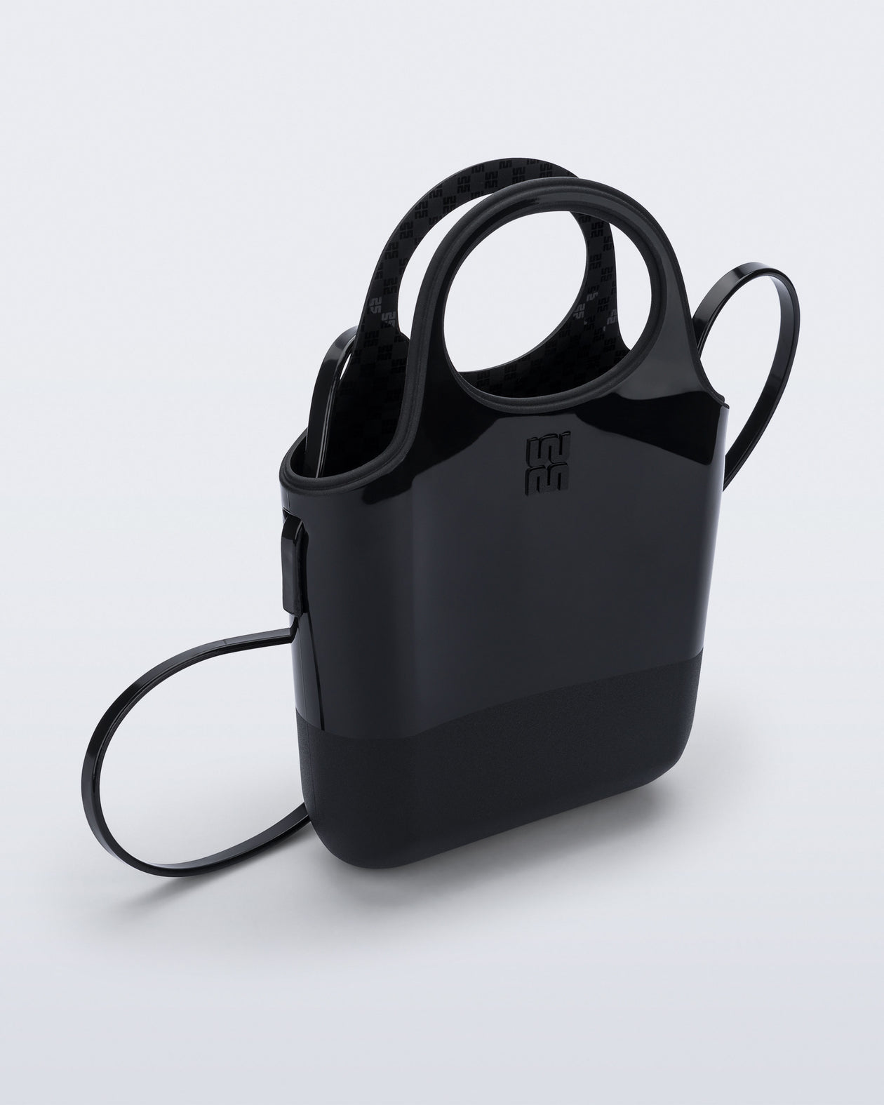 Angled view of a black Ultra Bag with handle and strap