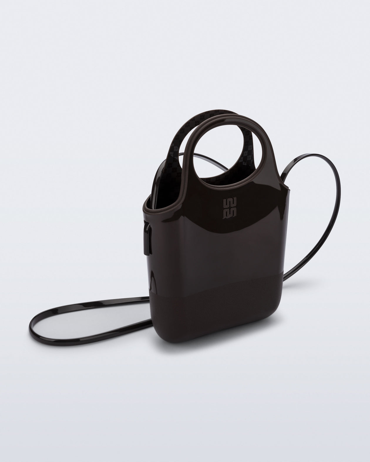 Angled view of a brown Ultra Bag with handle and strap
