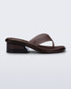 Side view of a brown Margot flip flop with low heel 