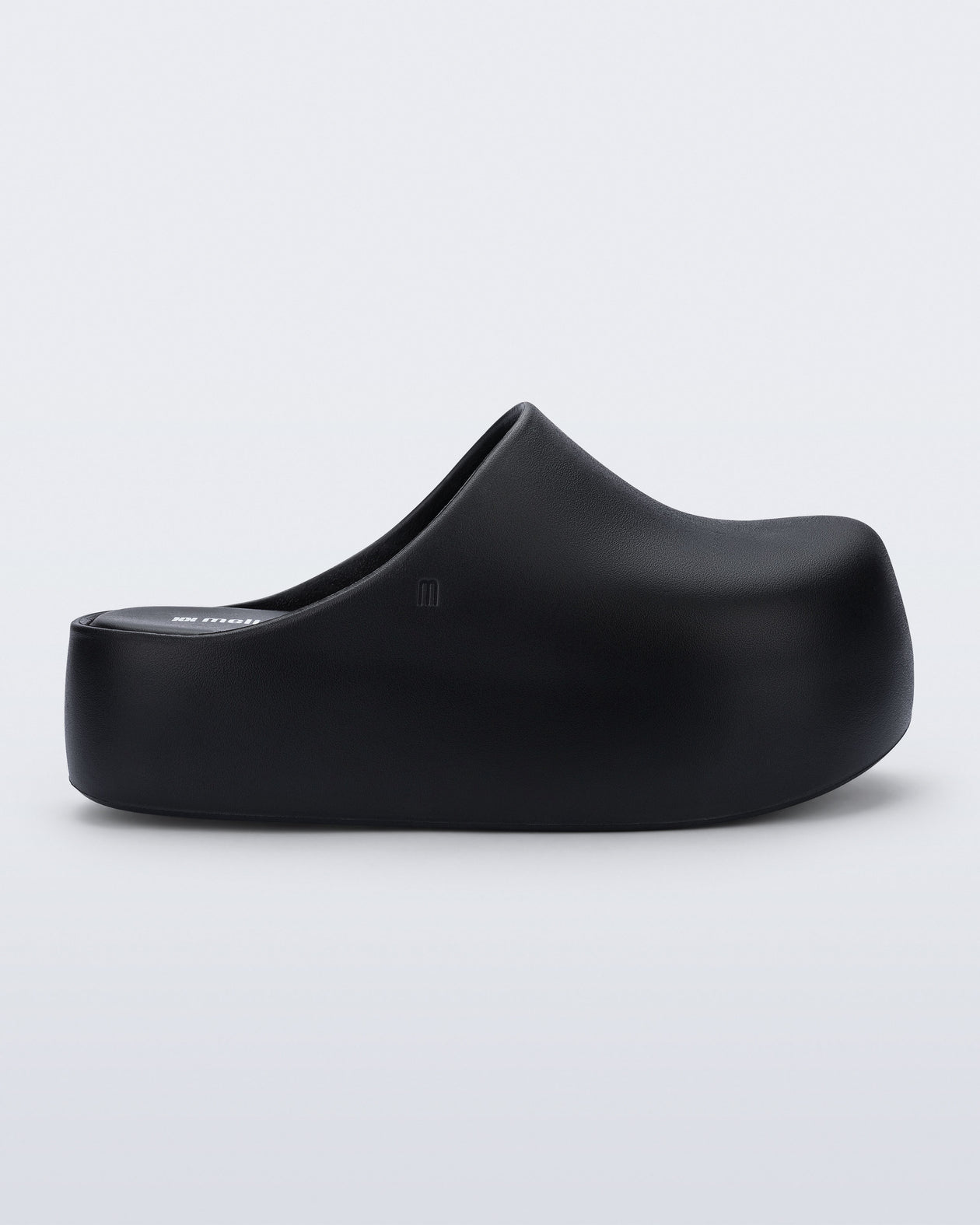Side view of a black Free Clog Up Platform 