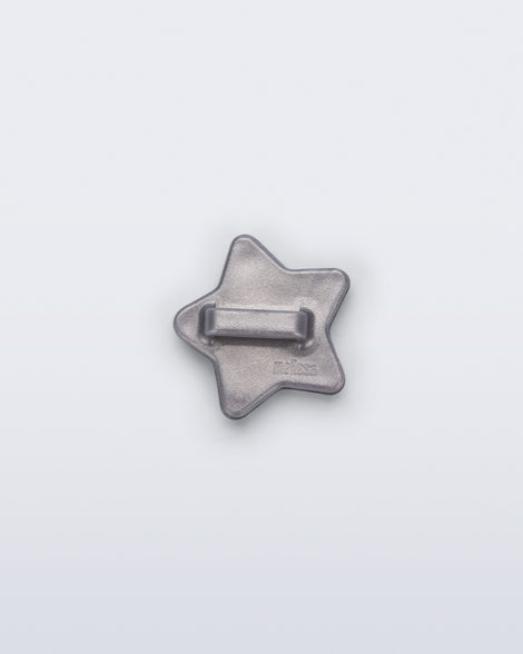 Back view of a silver star shoe charm