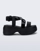 Side view of a black Stand platform sandal