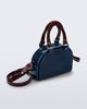 Angled view of a blue Bowling bag with burgundy handle strap and cross body strap