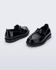 Back and angled view of a pair of black Royal Love baby loafers