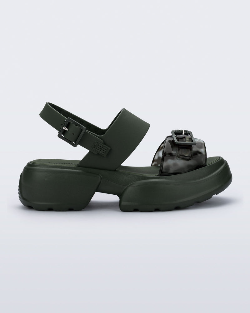Side view of a green Push platform Sandal 