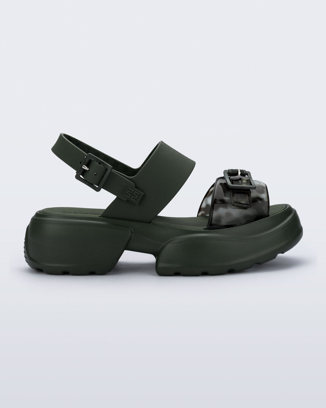 Side view of a green Push platform Sandal 