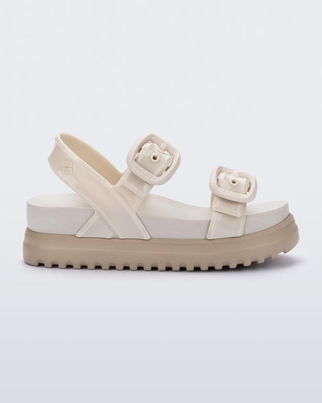 Side view of a beige Cozy Sandal Platform