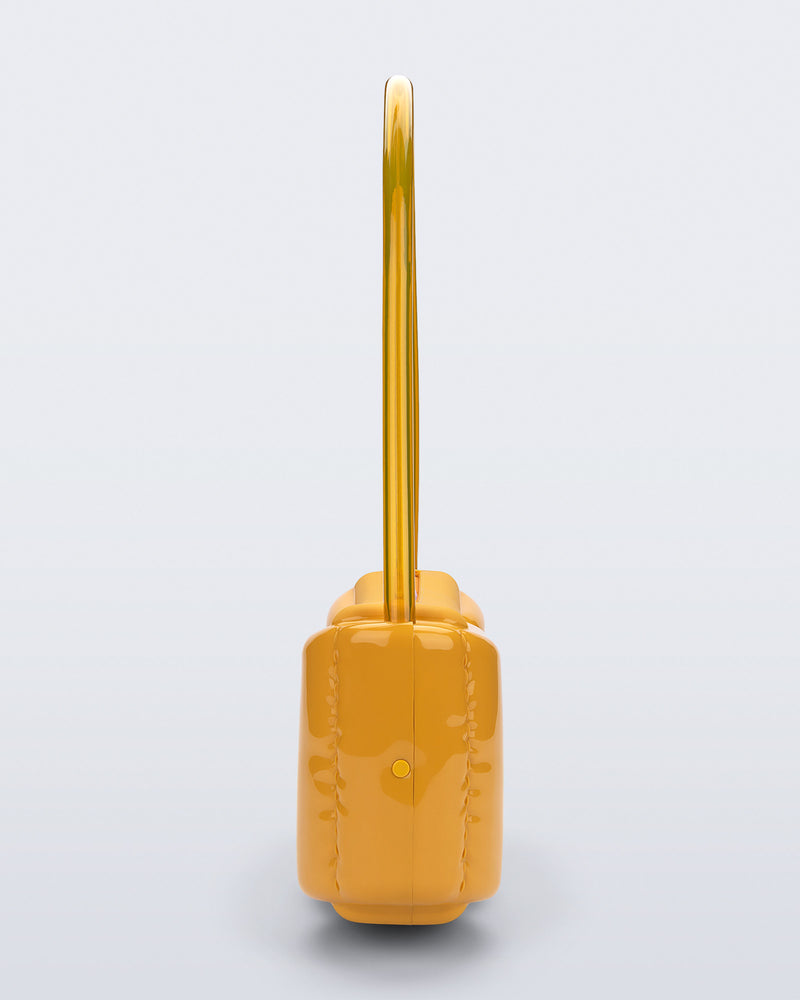 Side view of a yellow Airflow bag with shoulder strap