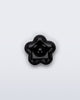 Front view of a black flower shoe charm