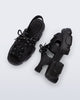 Top and side view of a pair of black Camp platform sandals with black laces