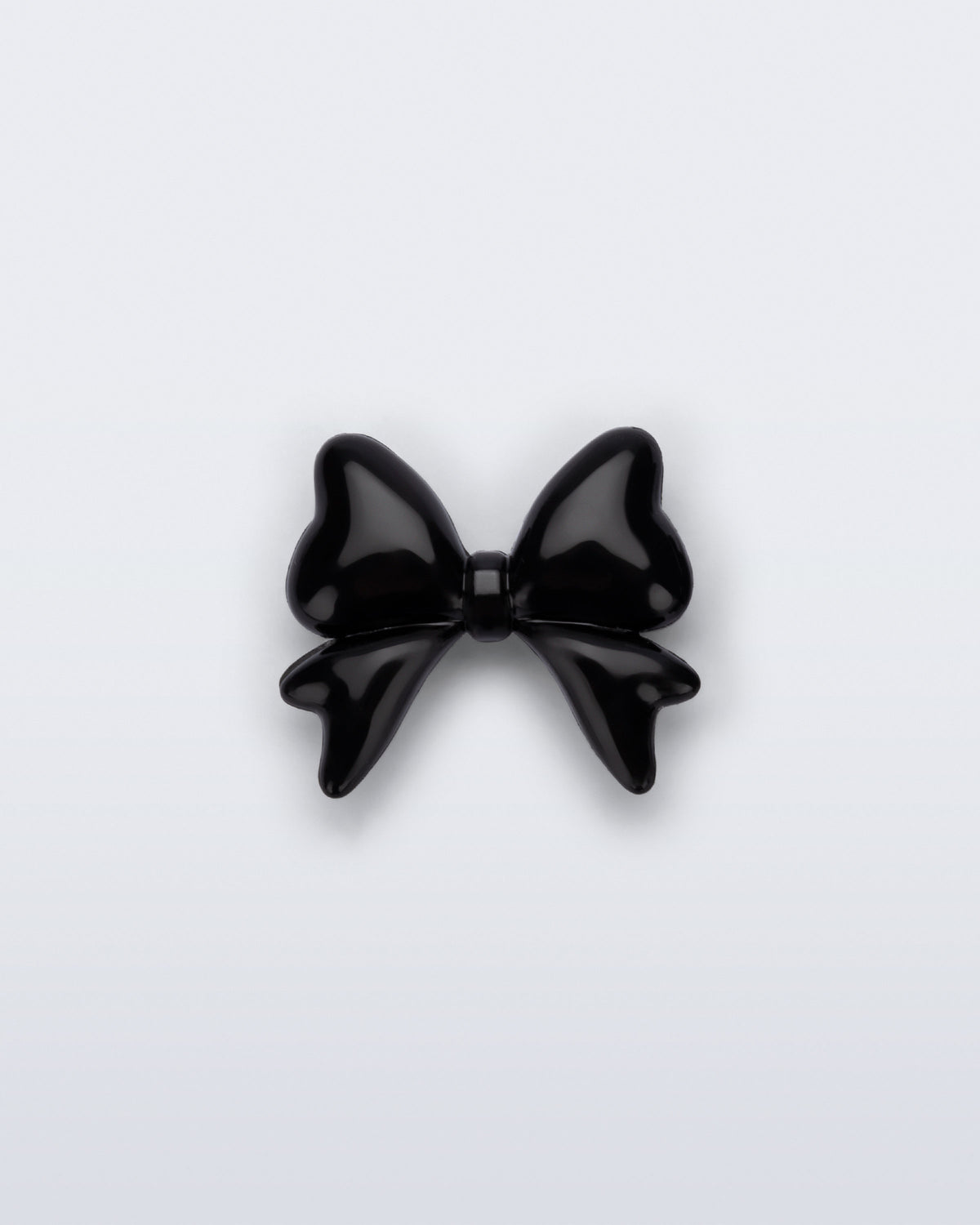 Front view of a black bow shoe charm