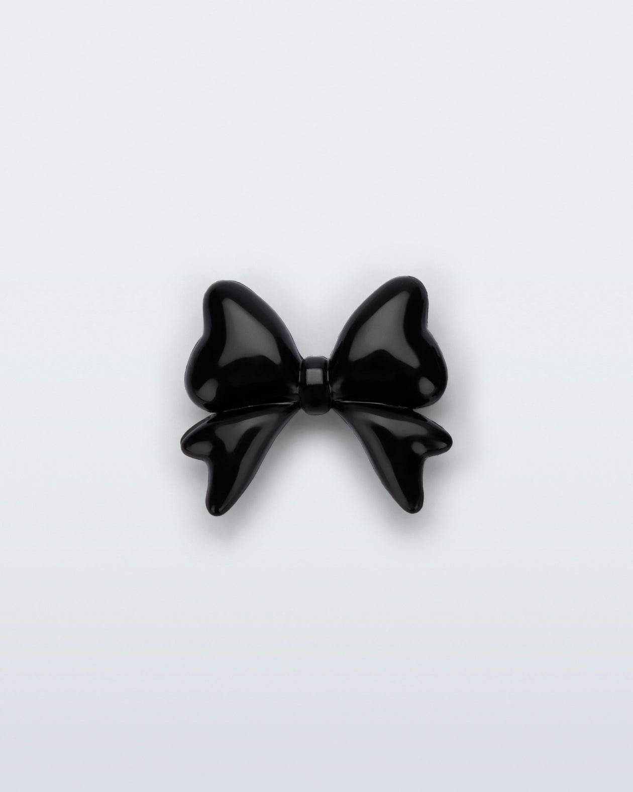 Front view of a black bow shoe charm