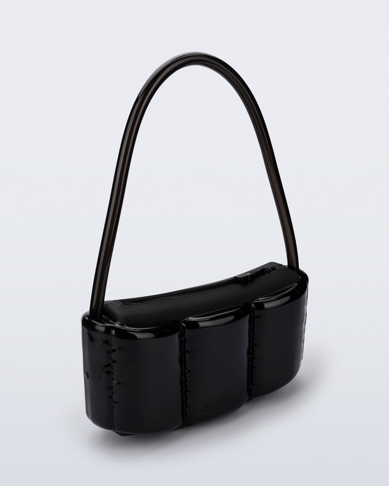 Angled view of a black Airflow bag with shoulder strap