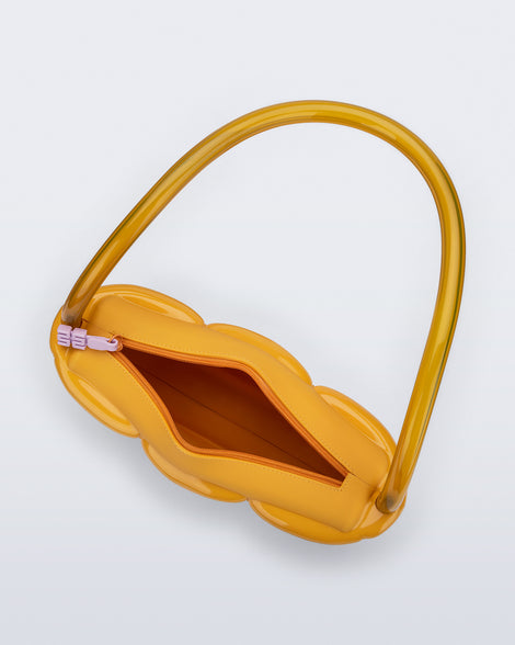 Top view of a yellow Airflow bag with shoulder strap