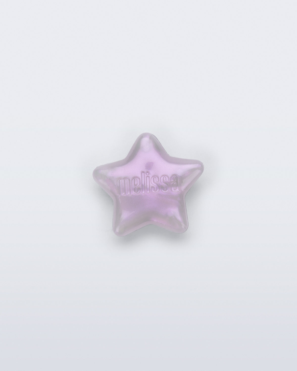 Front view of a pearly lilac star shoe charm
