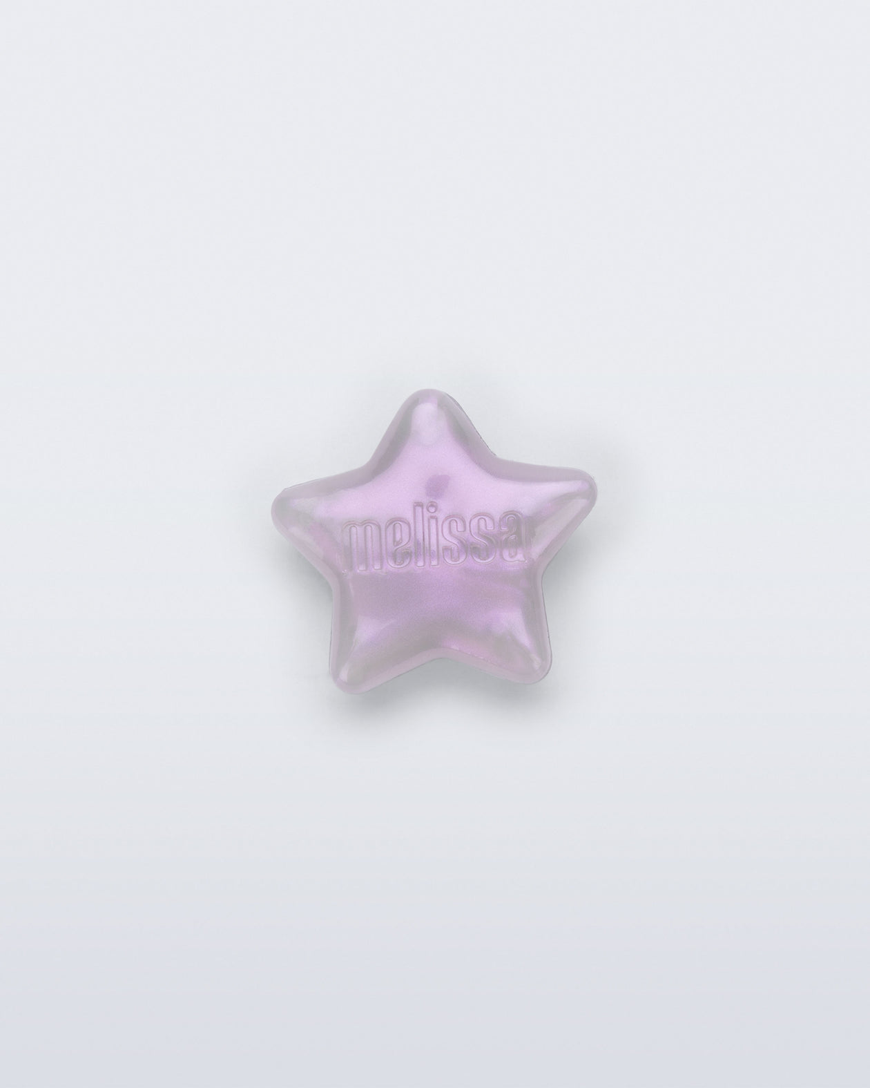 Front view of a pearly lilac star shoe charm