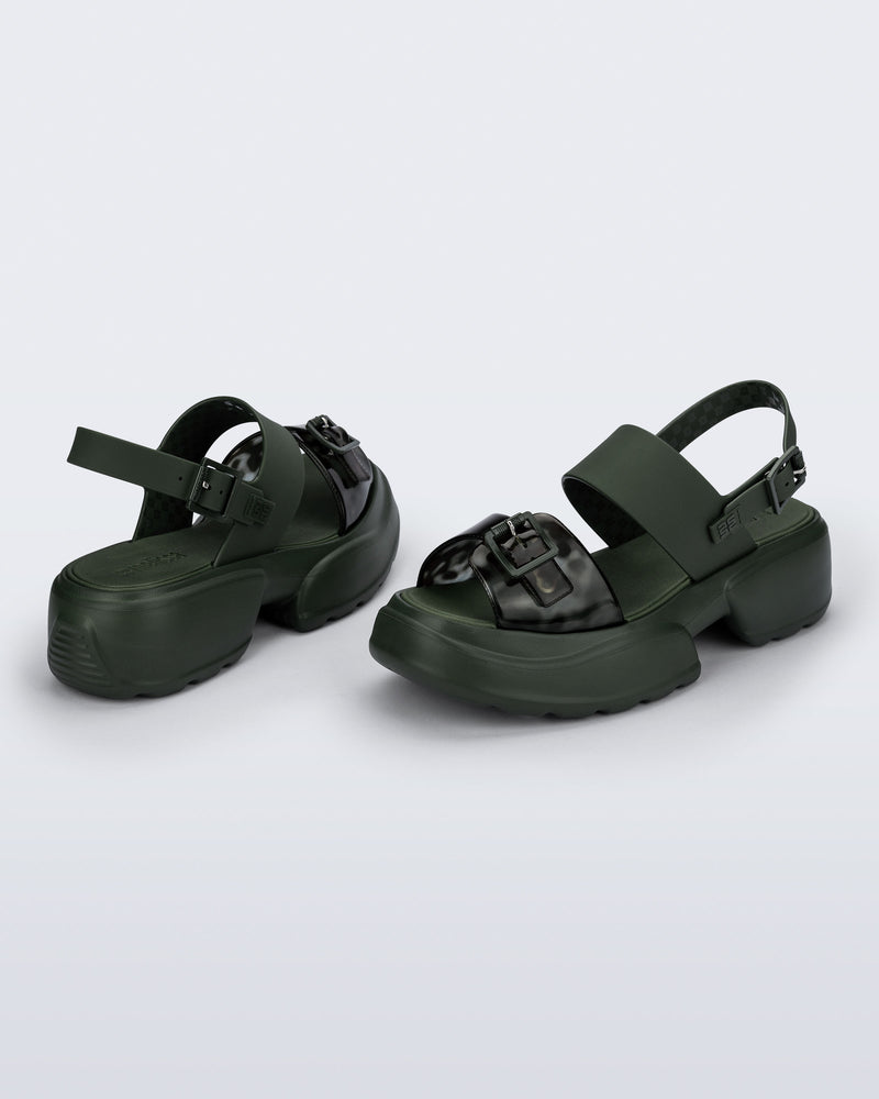 Back and angled view of a pair of green Push platform Sandals