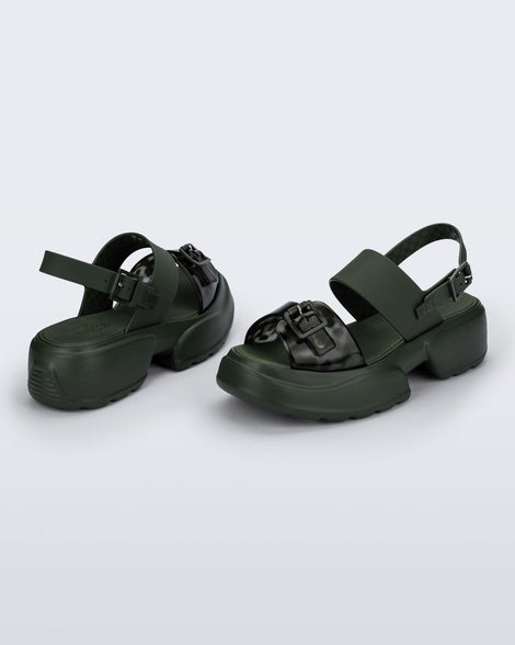Back and angled view of a pair of green Push platform Sandals