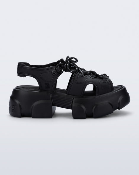 side view of a black Camp platform sandal with black laces