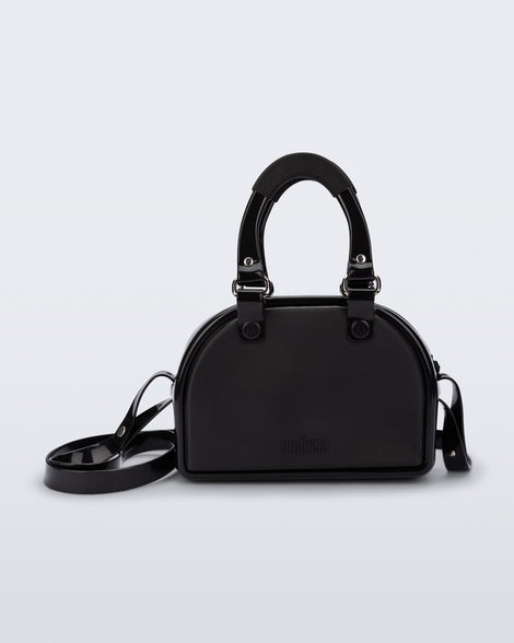 Front view of a black Bowling bag with handle strap and cross body strap