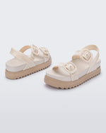 Back and angled view of a pair of beige Cozy Sandal Platforms