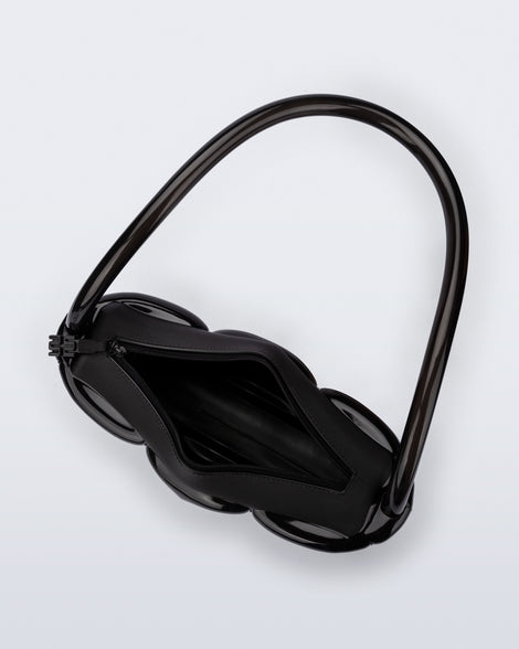 Top view of a black Airflow bag with shoulder strap