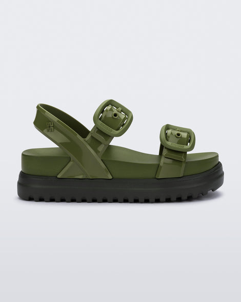 Side view of a green Cozy Sandal Platform with dark green sole