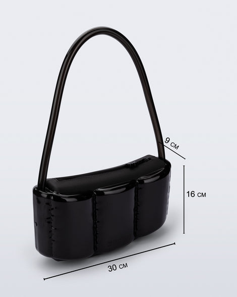 Angled view of a black Airflow bag with shoulder strap with bag dimensions 30 cm x 9 cm x 16 cm