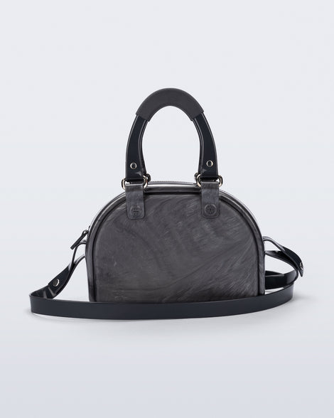 Back view of a grey Bowling bag with black handle strap and cross body strap