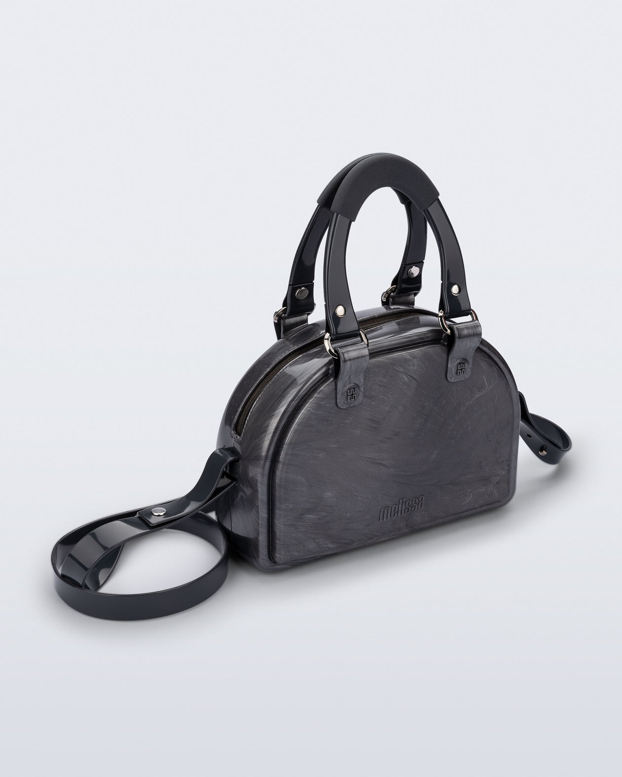 Angled view of a grey Bowling bag with black handle strap and cross body strap