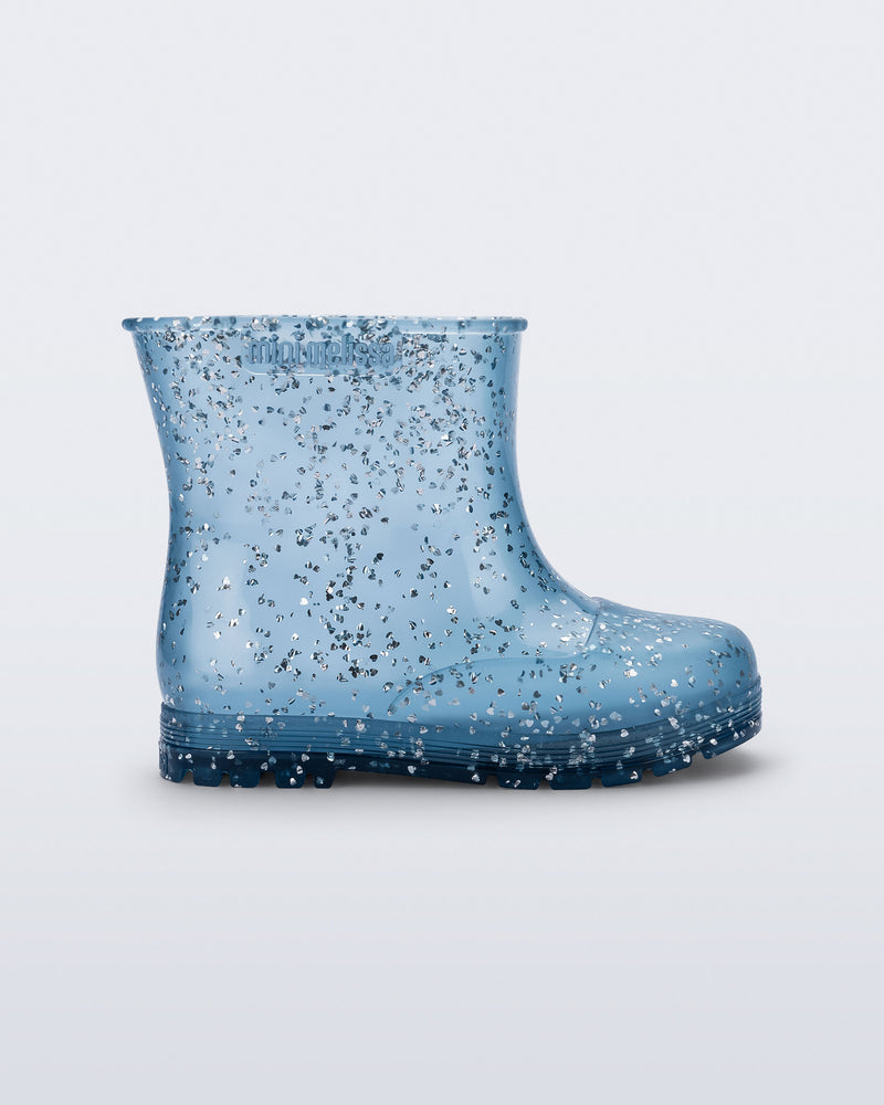 Side view of a blue glitter Welly baby rain boot