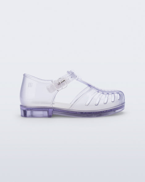 Side view of a clear Aranha 79 baby flat with buckle