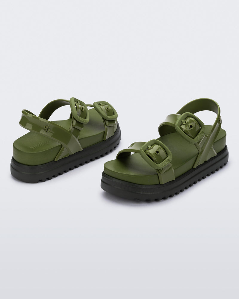 Back and angled view of a pair of green Cozy Sandal Platforms with dark green soles