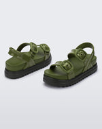 Back and angled view of a pair of green Cozy Sandal Platforms with dark green soles
