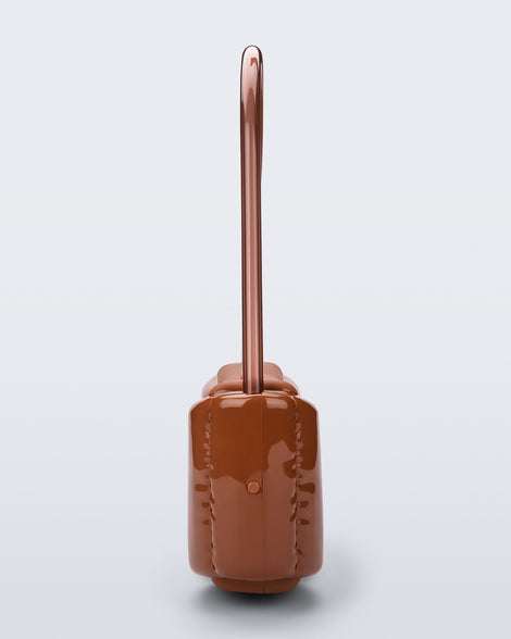 Side view of a brown Airflow bag with shoulder strap