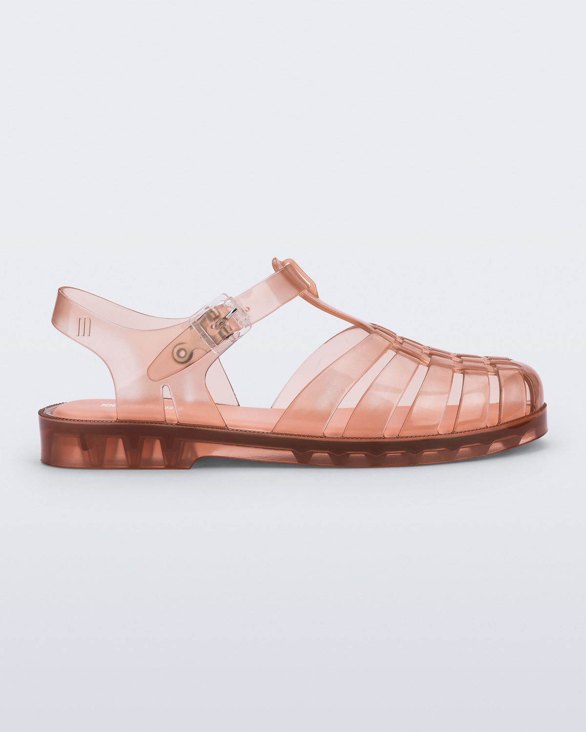 Side view of a clear peach Possession fisherman sandal