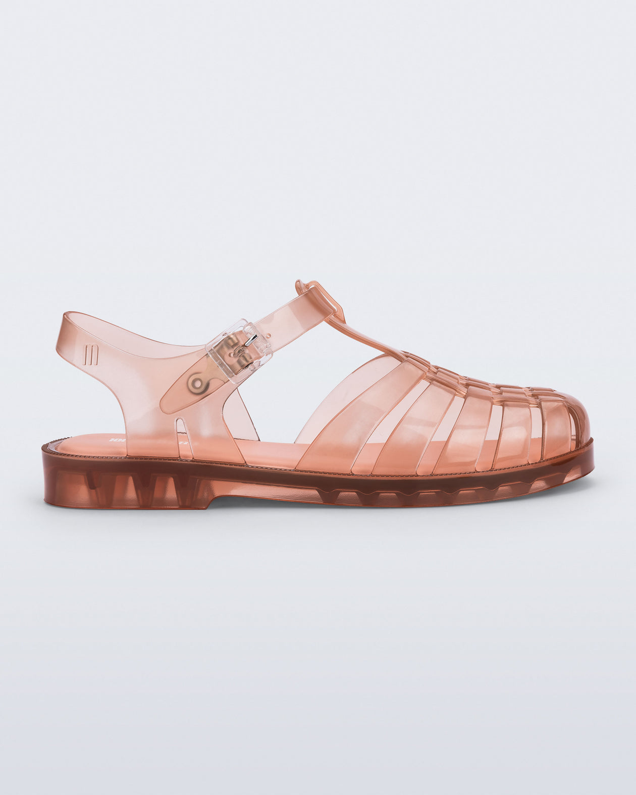 Side view of a clear peach Possession fisherman sandal