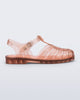 Side view of a clear peach Possession fisherman sandal