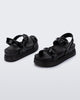 Back and angled view of a pair of black Cozy Sandal Platforms